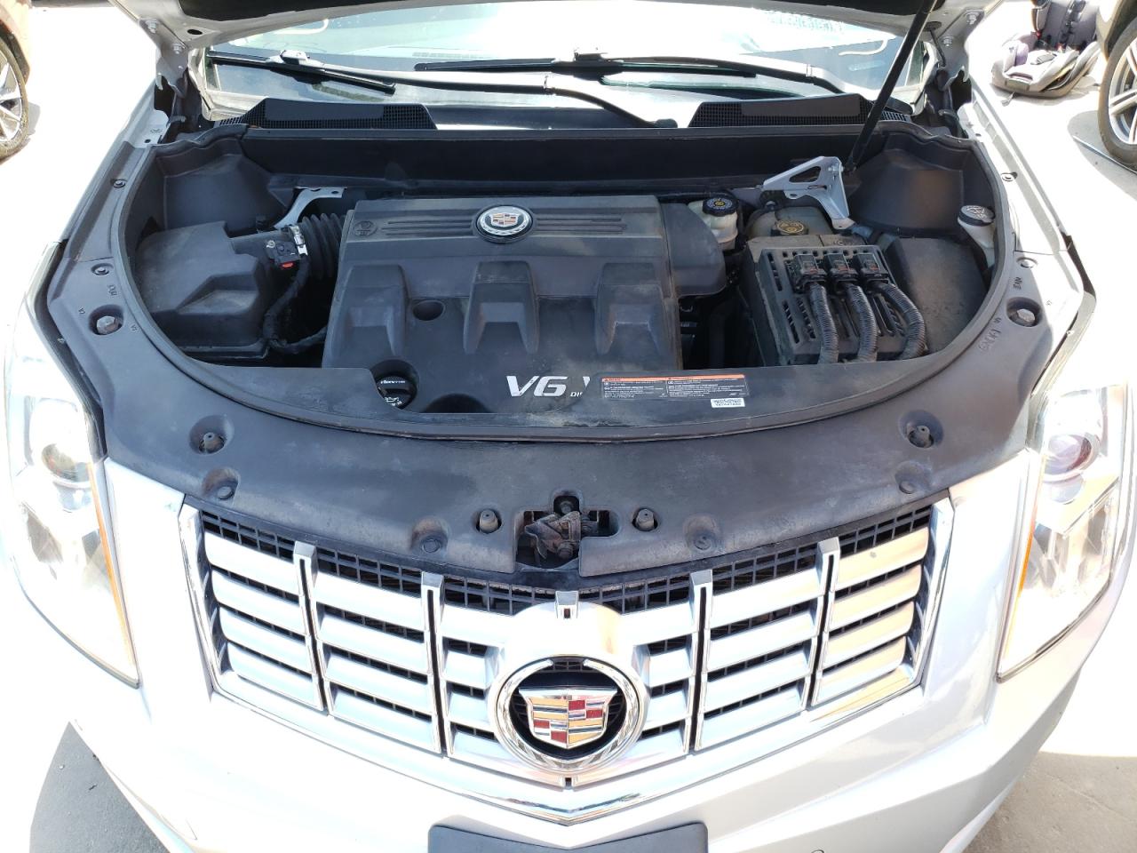 Photo 7 from auction – 2014 CADILLAC SRX LUXURY with VIN 3GYFNBE38ES550101
