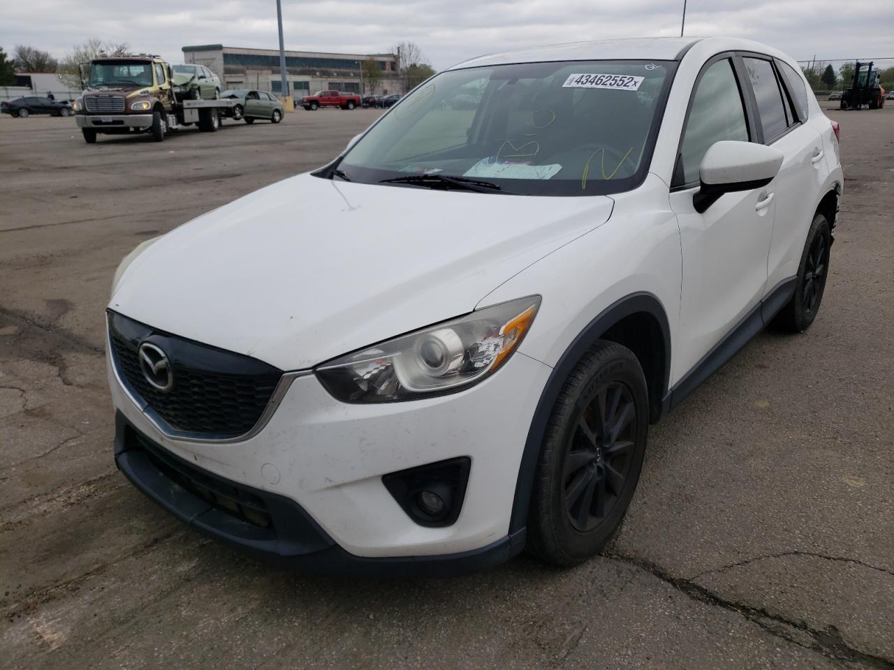 Photo 2 from auction – 2015 MAZDA CX-5 TOURI with VIN JM3KE2CY1F0433771