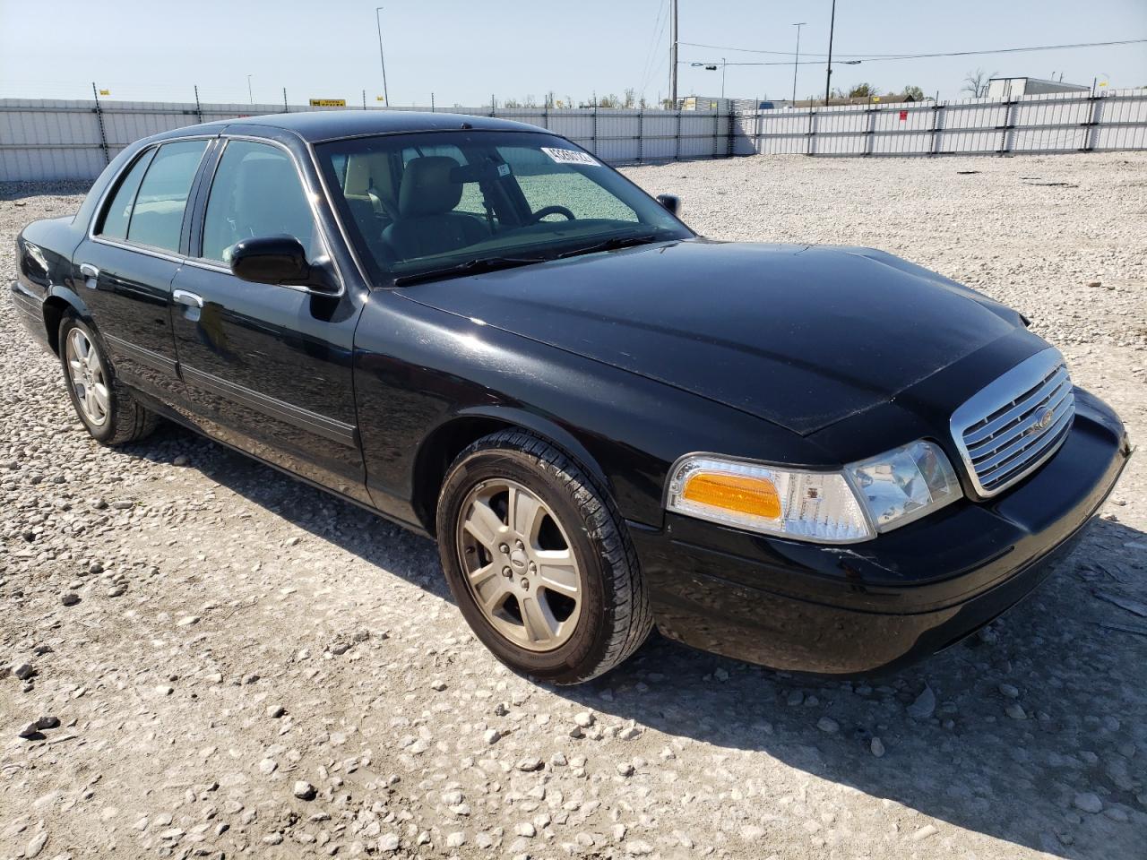 FORD CROWN VICT 2011 with VIN 2FABP7EV9BX174869 - Photo from auction