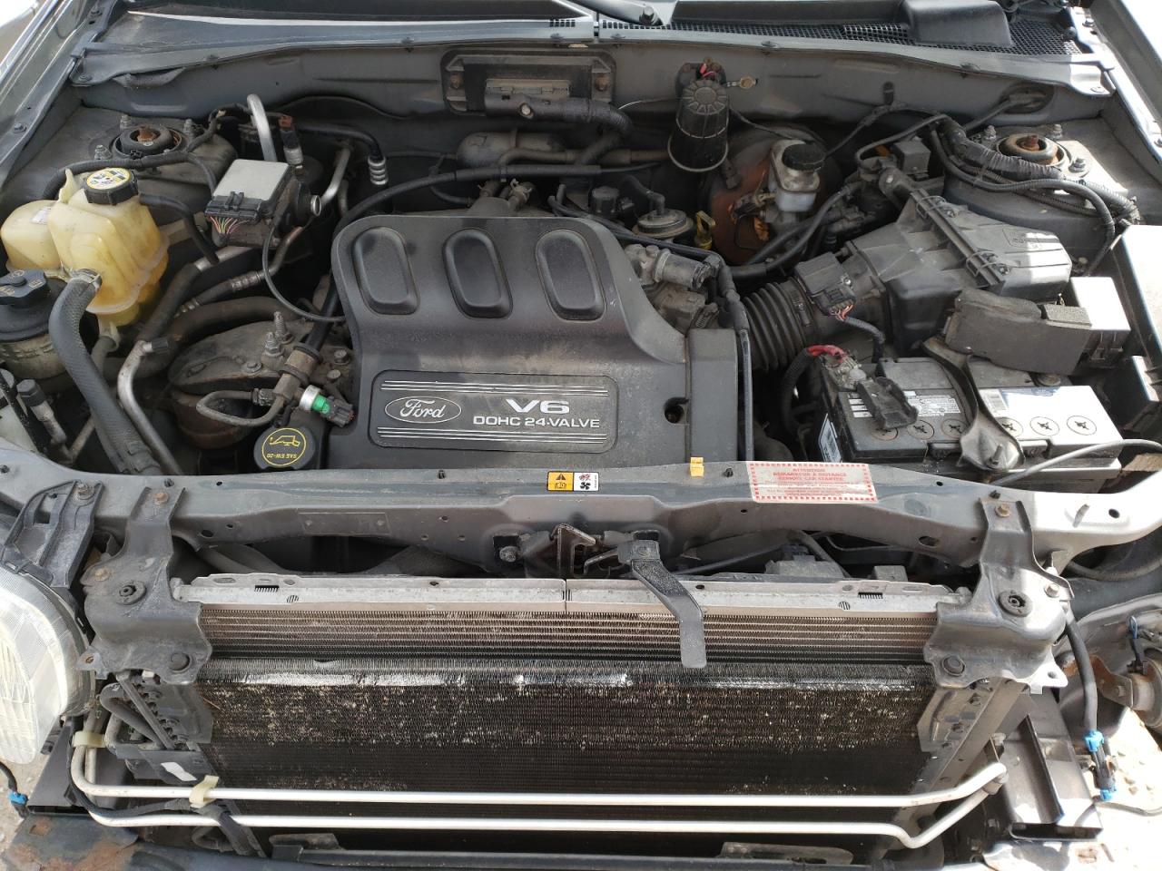 Photo 7 from auction – 2002 FORD ESCAPE XLT with VIN 1FMYU04122KC38476