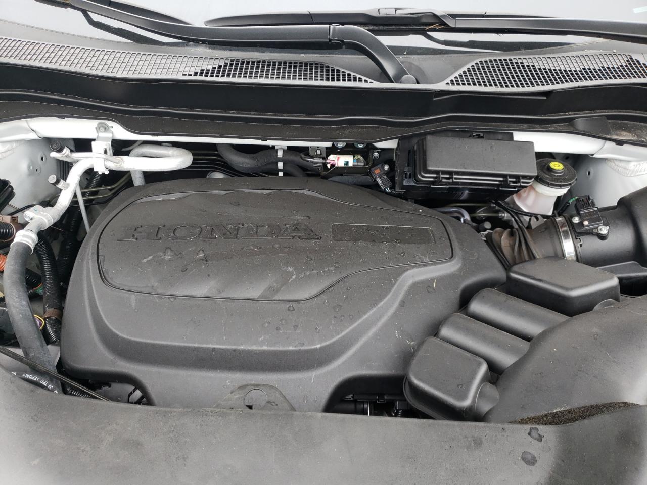 Photo 7 from auction – 2021 HONDA PILOT TOUR with VIN 5FNYF5H64MB011968