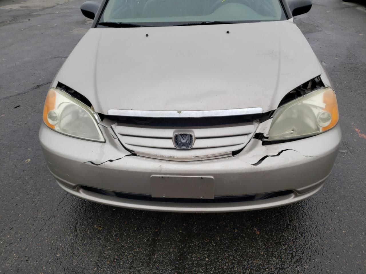 Photo 9 from auction – 2002 HONDA CIVIC LX with VIN 1HGES16502L033740