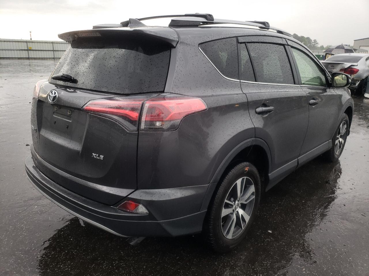 Photo 4 from auction – 2017 TOYOTA RAV4 XLE with VIN JTMWFREV1HJ703422
