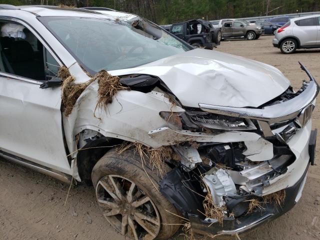 Photo 9 from auction – 2021 HONDA PILOT ELIT with VIN 5FNYF6H06MB074118
