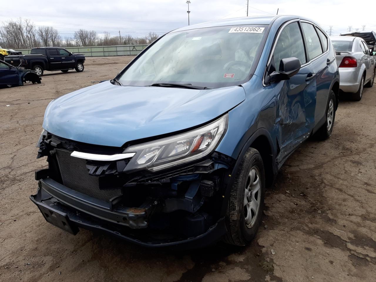 Photo 2 from auction – 2015 HONDA CR-V LX with VIN 5J6RM4H38FL071739