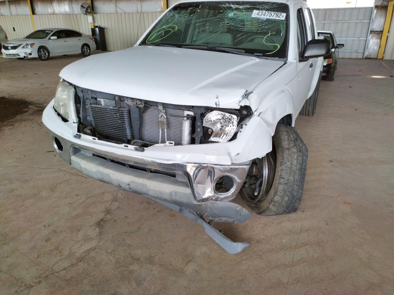 Photo 9 from auction – 2009 NISSAN FRONTIER C with VIN 1N6AD07W39C410402