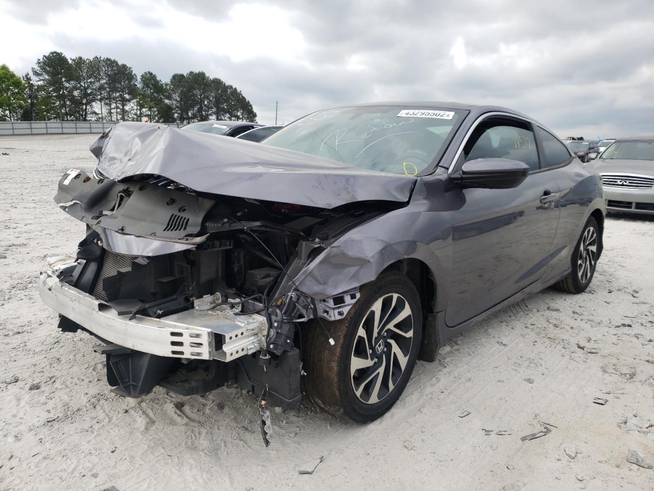 Photo 2 from auction – 2018 HONDA CIVIC LX with VIN 2HGFC4B03JH301625