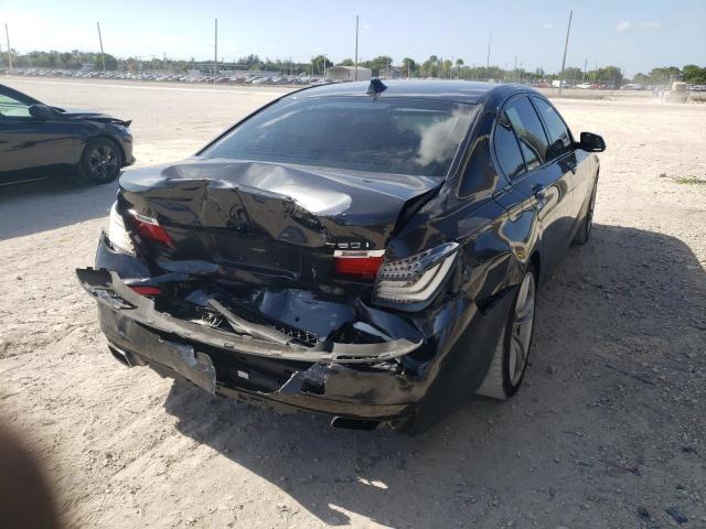 Photo 6 from auction – 2014 BMW 750 I with VIN WBAYA8C50ED825233
