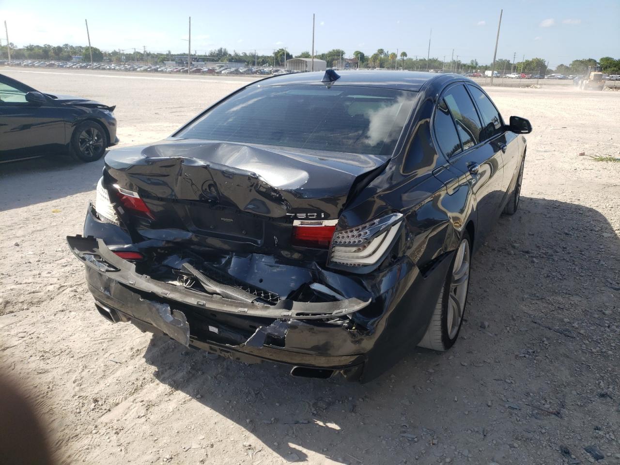 Photo 16 from auction – 2014 BMW 750 I with VIN WBAYA8C50ED825233