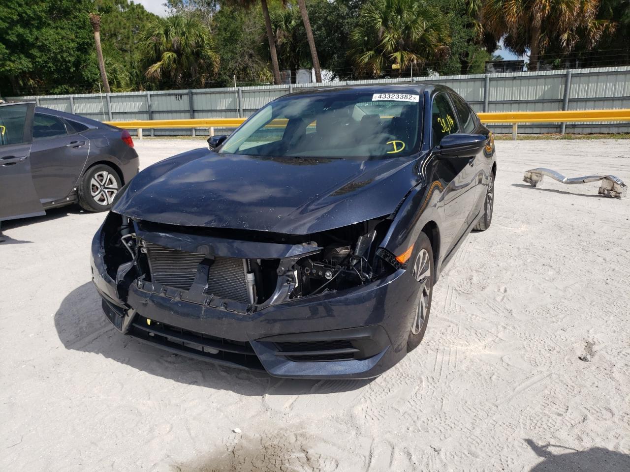Photo 2 from auction – 2018 HONDA CIVIC EX with VIN 2HGFC2F71JH589348