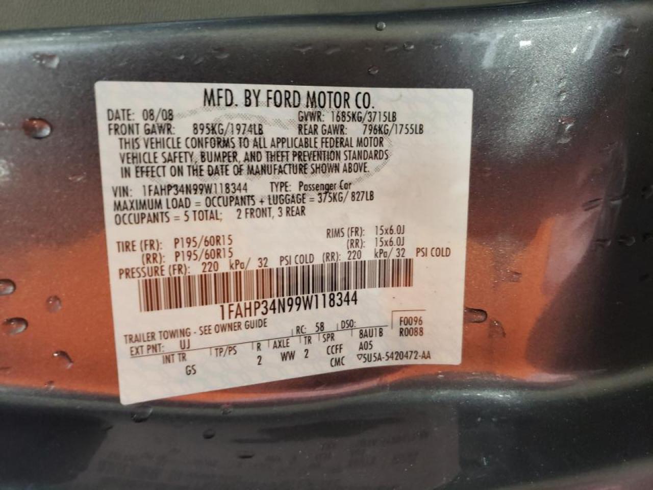 Photo 10 from auction – 2009 FORD FOCUS S with VIN 1FAHP34N99W118344