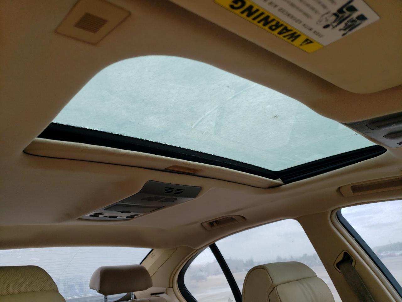 Photo 9 from auction – 2005 BMW 745 I with VIN WBAGL63555DP74659