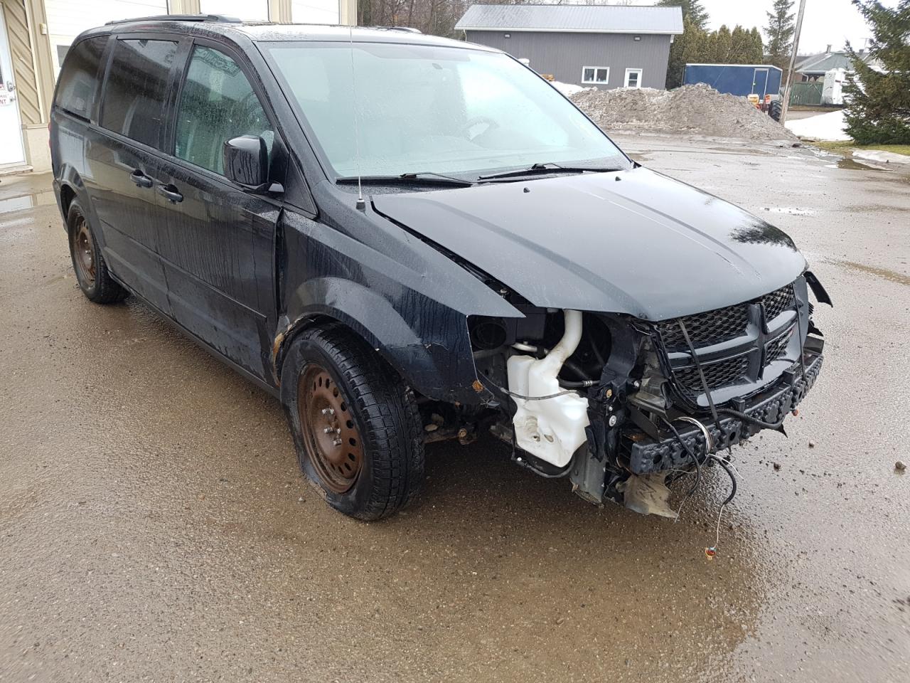 DODGE GRAND CARA 2016 with VIN 2C4RDGEG0GR197584 - Photo from auction