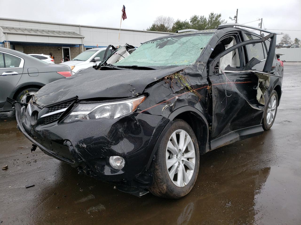 Photo 2 from auction – 2015 TOYOTA RAV4 LIMIT with VIN 2T3DFREV6FW257600