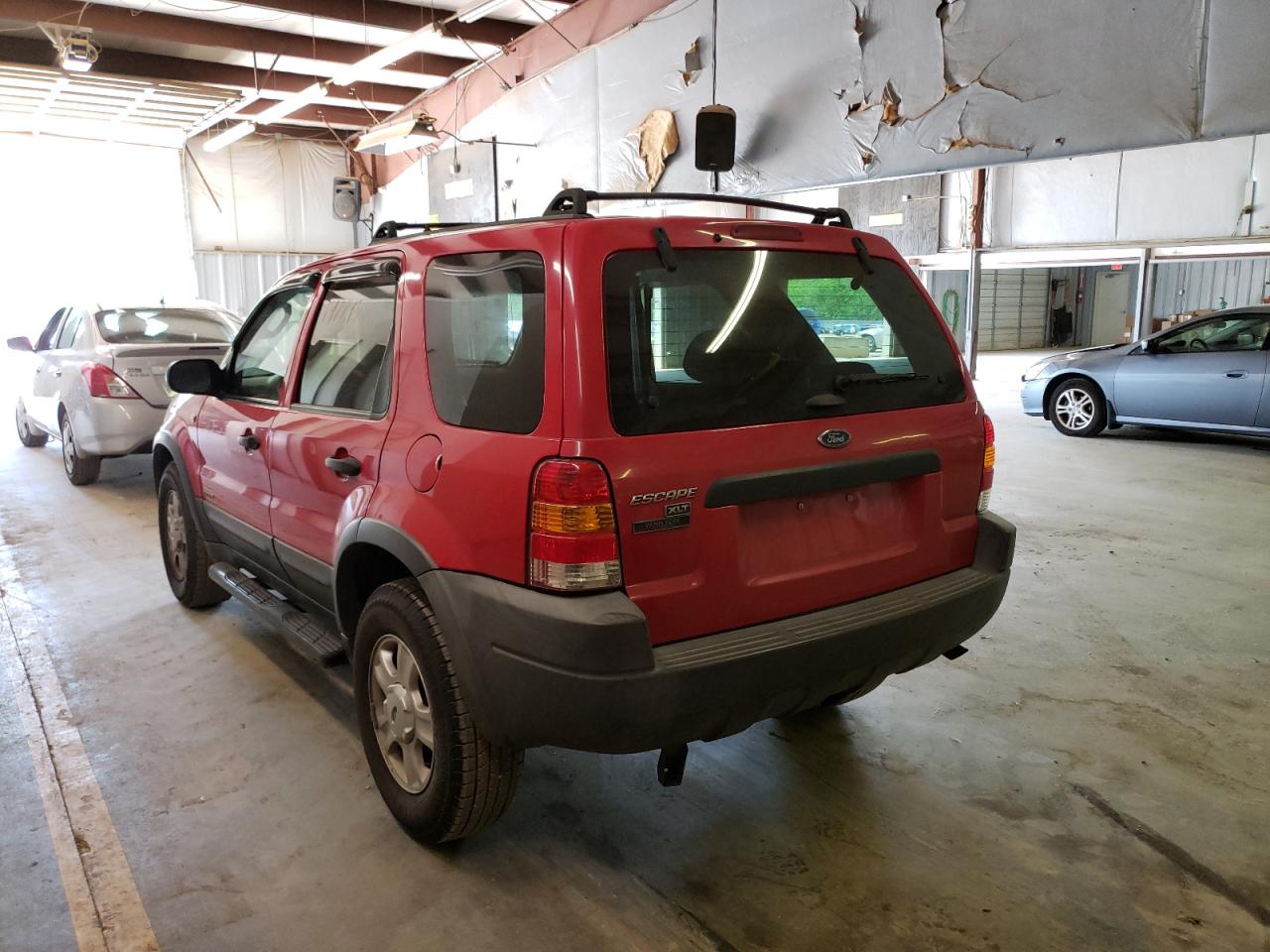 Photo 3 from auction – 2002 FORD ESCAPE XLT with VIN 1FMYU031X2KB14747