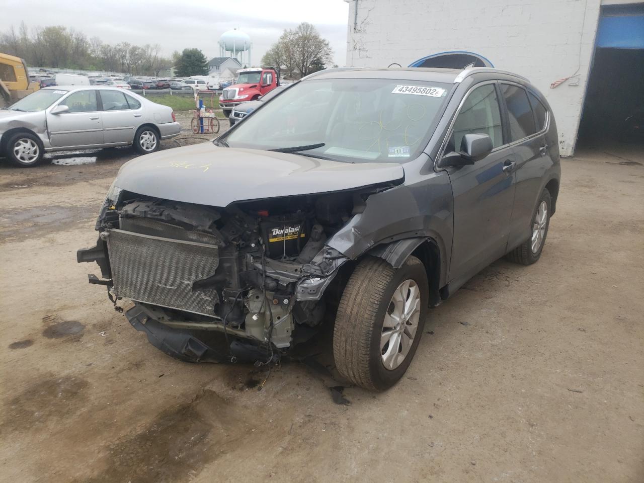 Photo 2 from auction – 2013 HONDA CR-V EXL with VIN 2HKRM4H79DH680722