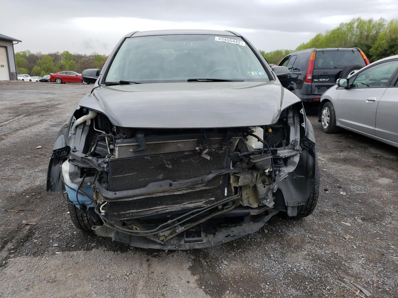 Photo 9 from auction – 2011 HONDA CR-V SE with VIN 5J6RE4H42BL094174