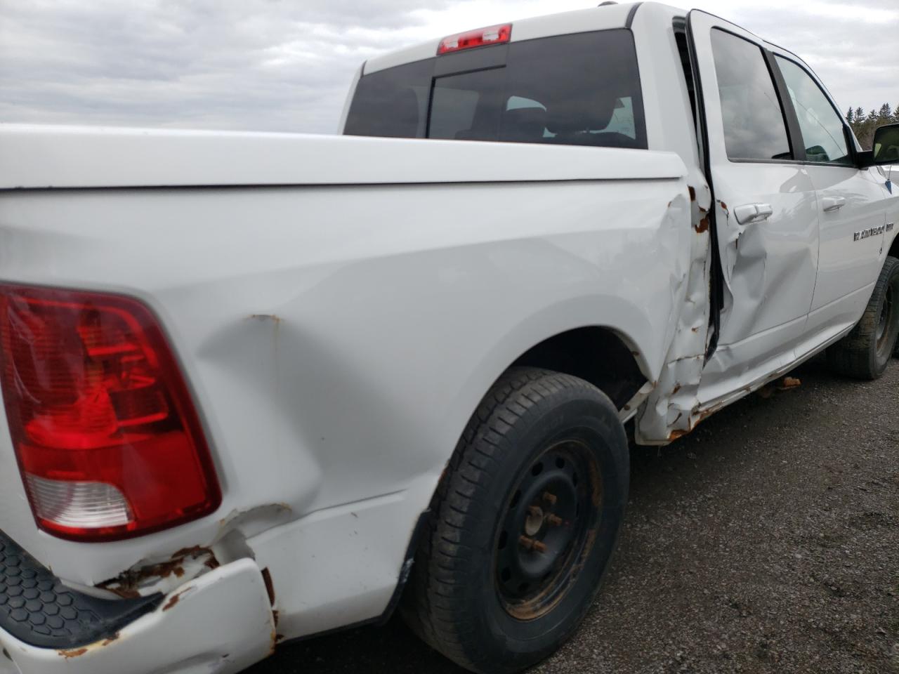 Photo 9 from auction – 2011 DODGE RAM 1500 with VIN 1D7RV1CT4BS623610