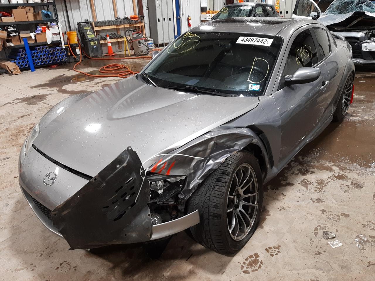 Photo 2 from auction – 2004 MAZDA RX8 with VIN JM1FE173640115144