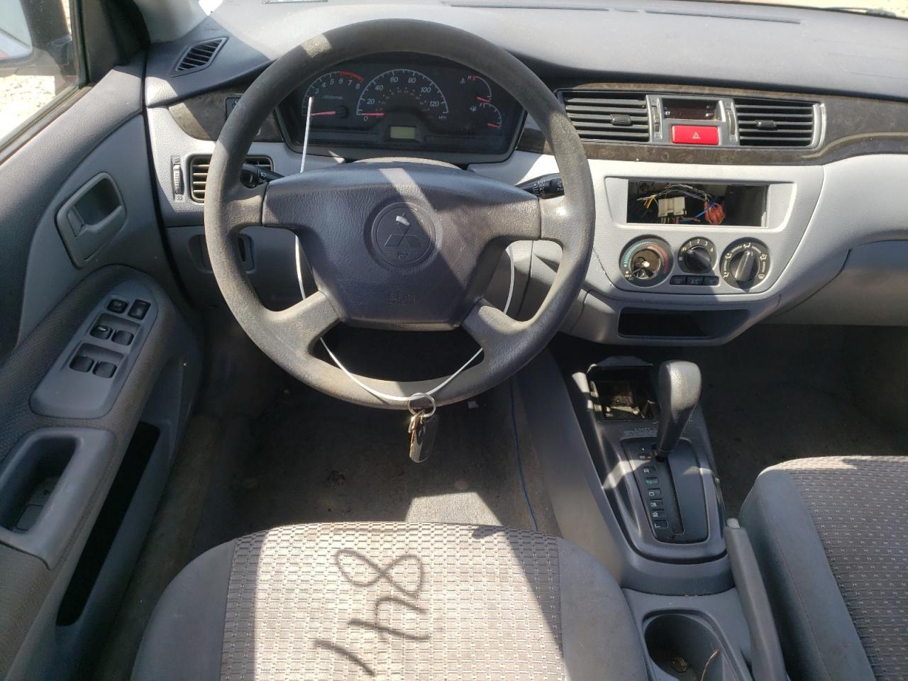 Photo 9 from auction – 2002 MITSUBISHI LANCER with VIN JA3AJ26E62U032087