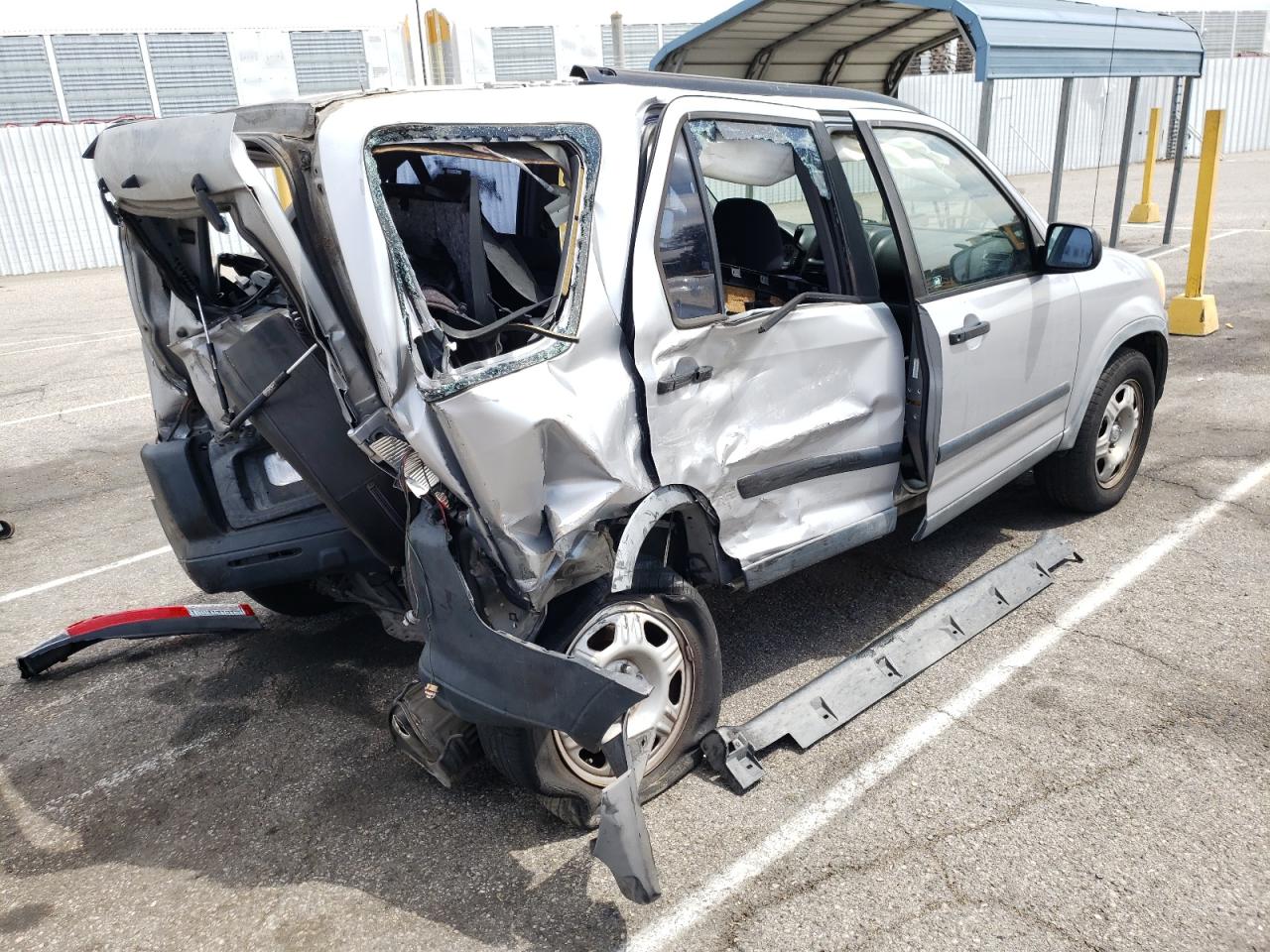 Photo 4 from auction – 2005 HONDA CR-V LX with VIN JHLRD68565C019479