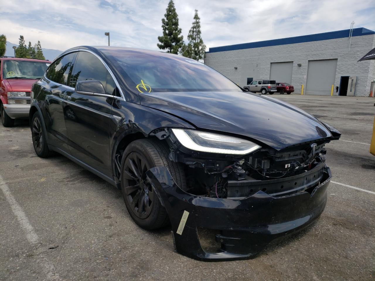 TESLA MODEL X 2016 with VIN 5YJXCBE25GF021160 - Photo from auction