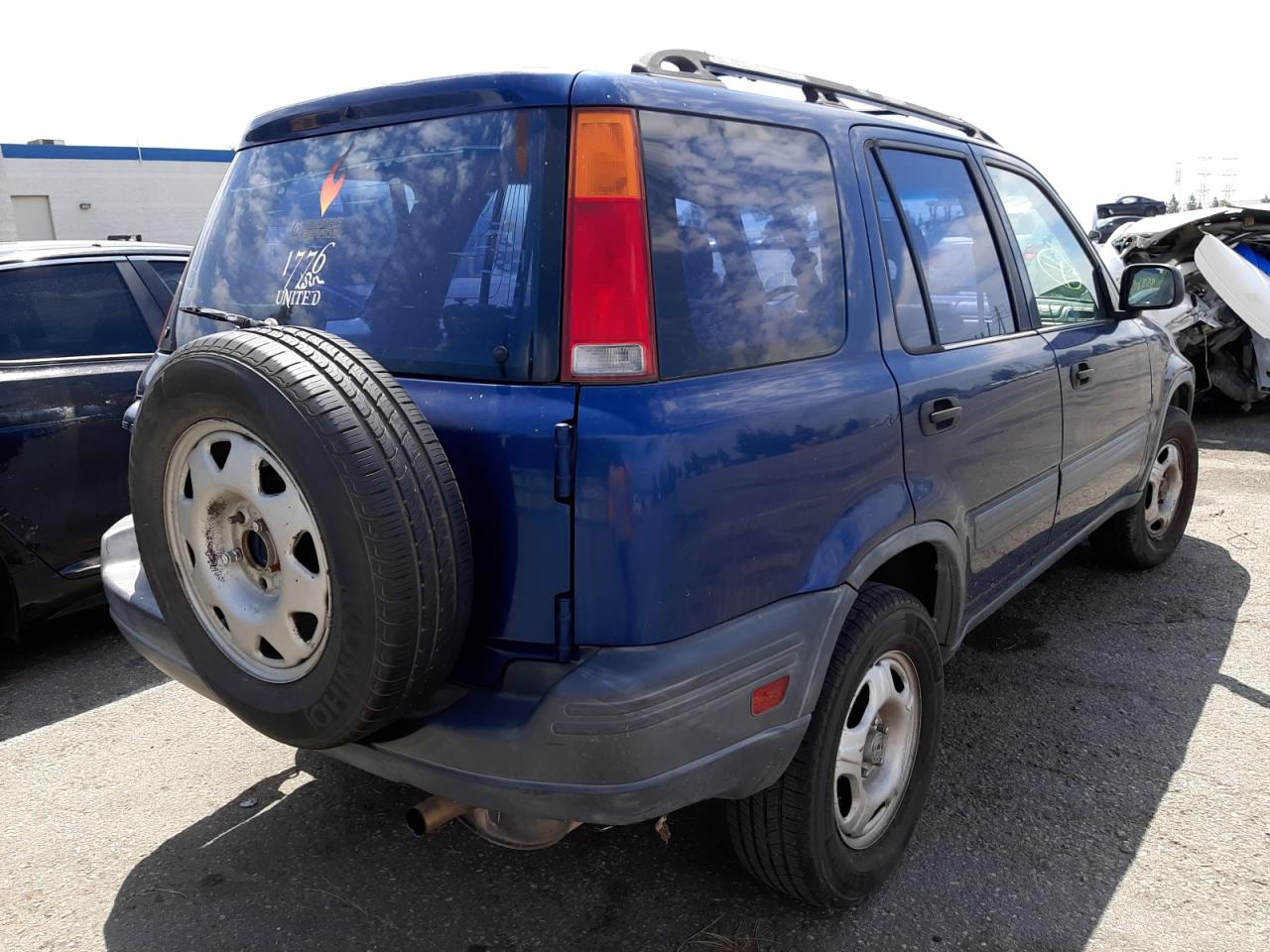 Photo 4 from auction – 1998 HONDA CR-V LX with VIN JHLRD2840WC011248