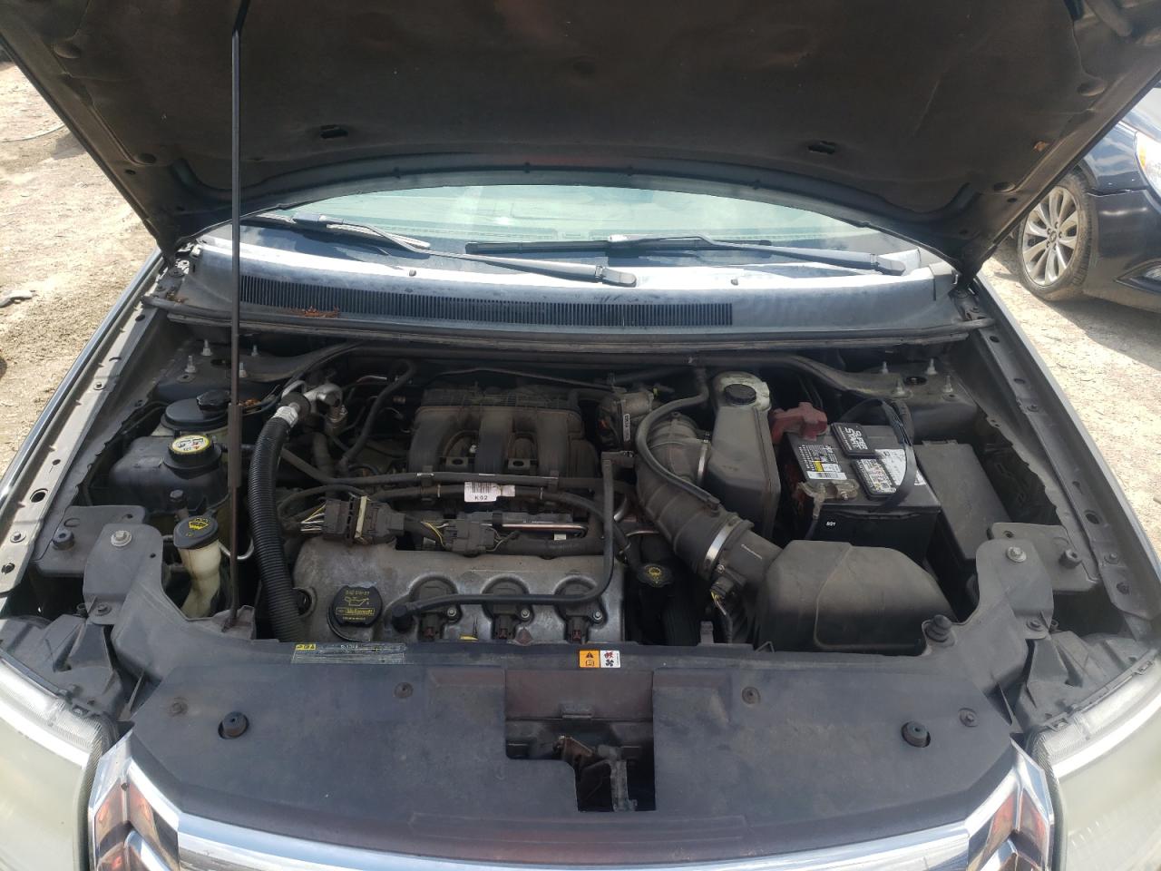 Photo 7 from auction – 2009 FORD TAURUS X S with VIN 1FMDK02W69GA06351