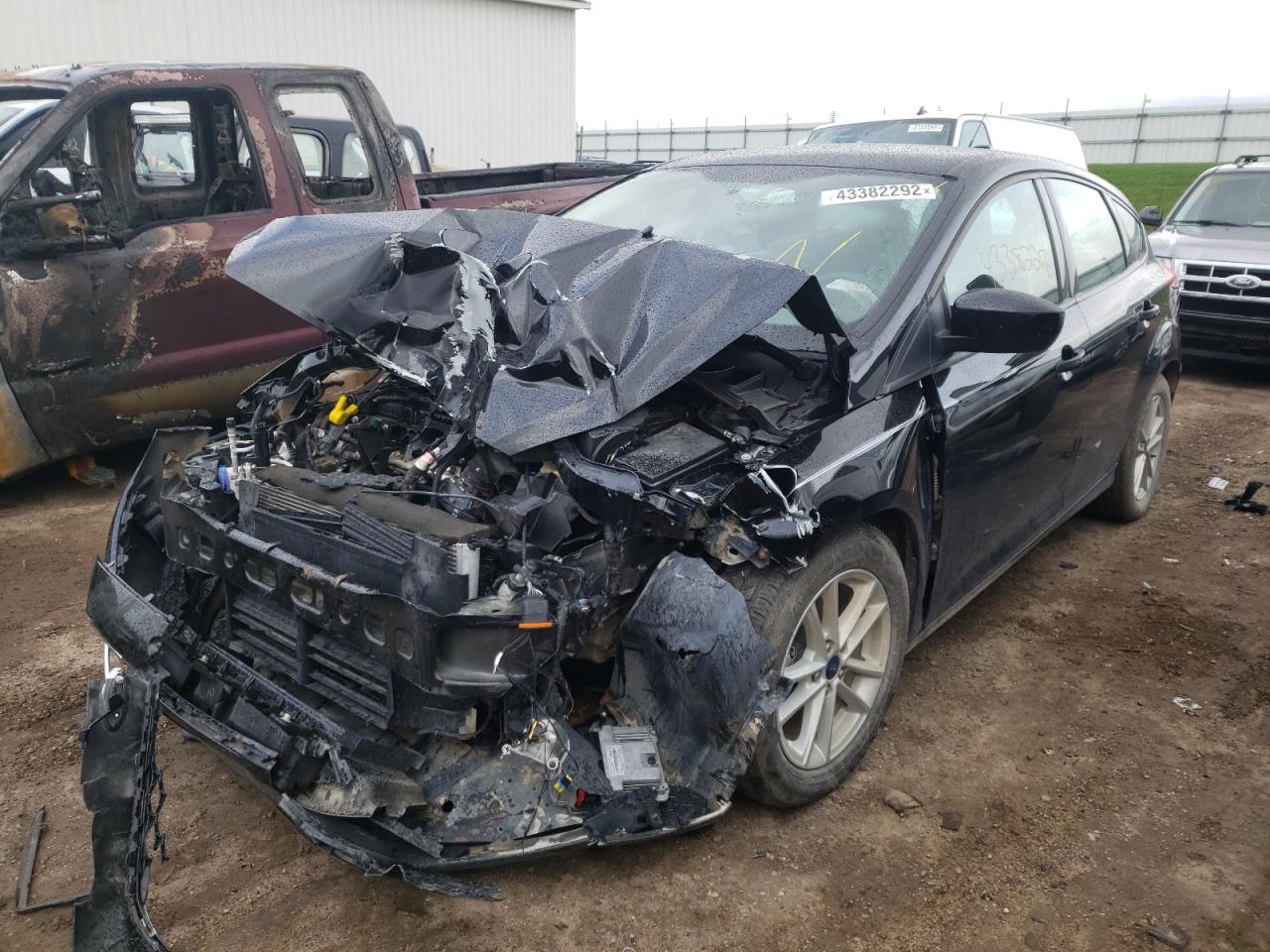 Photo 2 from auction – 2018 FORD FOCUS SE with VIN 1FADP3K27JL292586