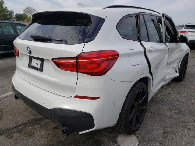 Photo 4 from auction – 2016 BMW X1 XDRIVE2 with VIN WBXHT3C3XG5E51327