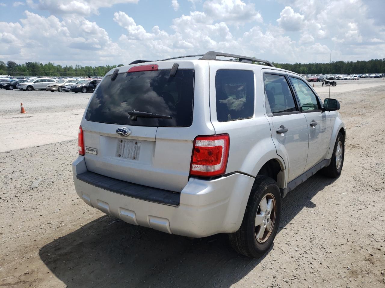 Photo 4 from auction – 2009 FORD ESCAPE XLS with VIN 1FMCU02779KB21973