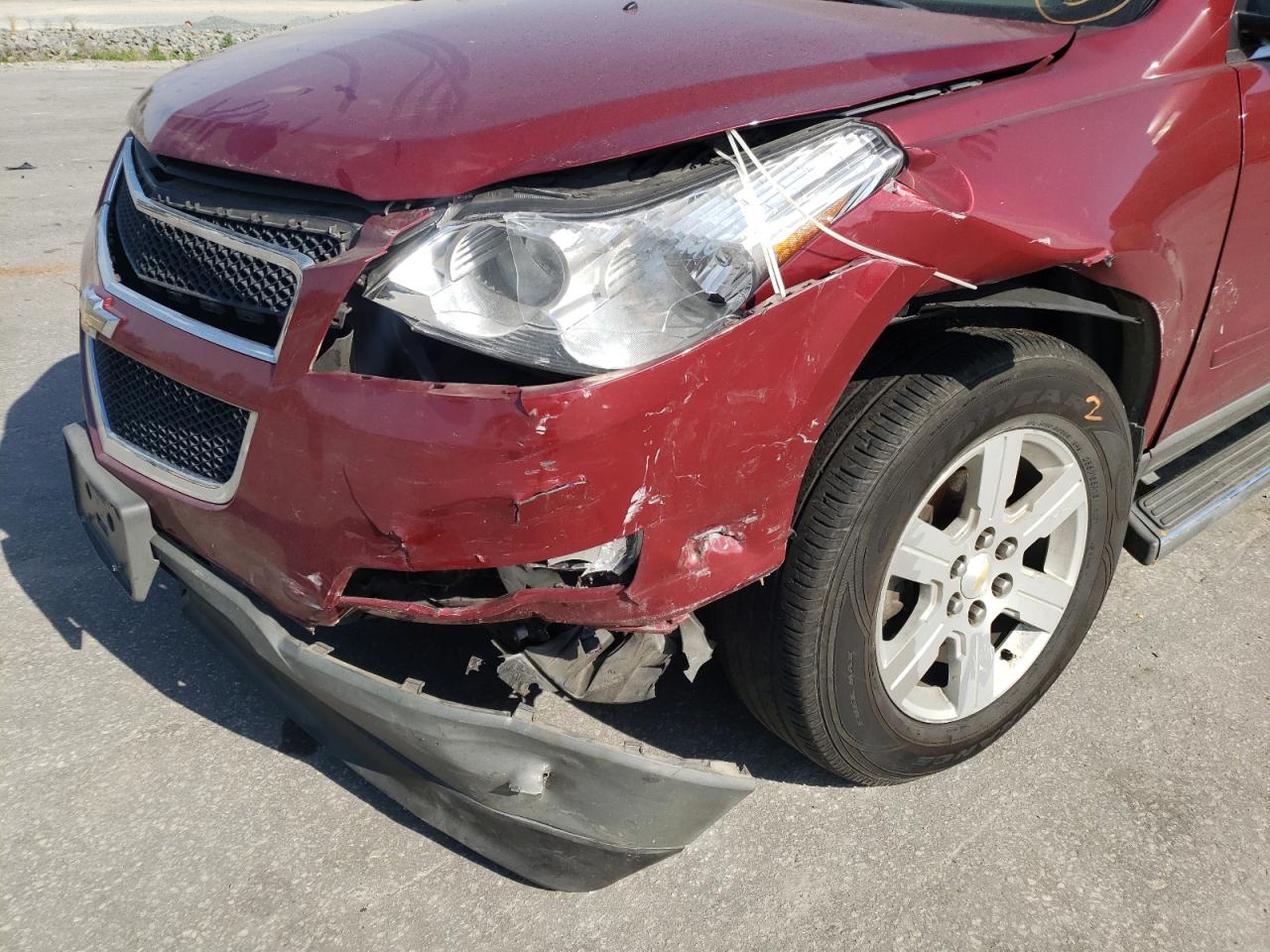 Photo 9 from auction – 2010 CHEVROLET TRAVERSE L with VIN 1GNLVFED6AJ254411