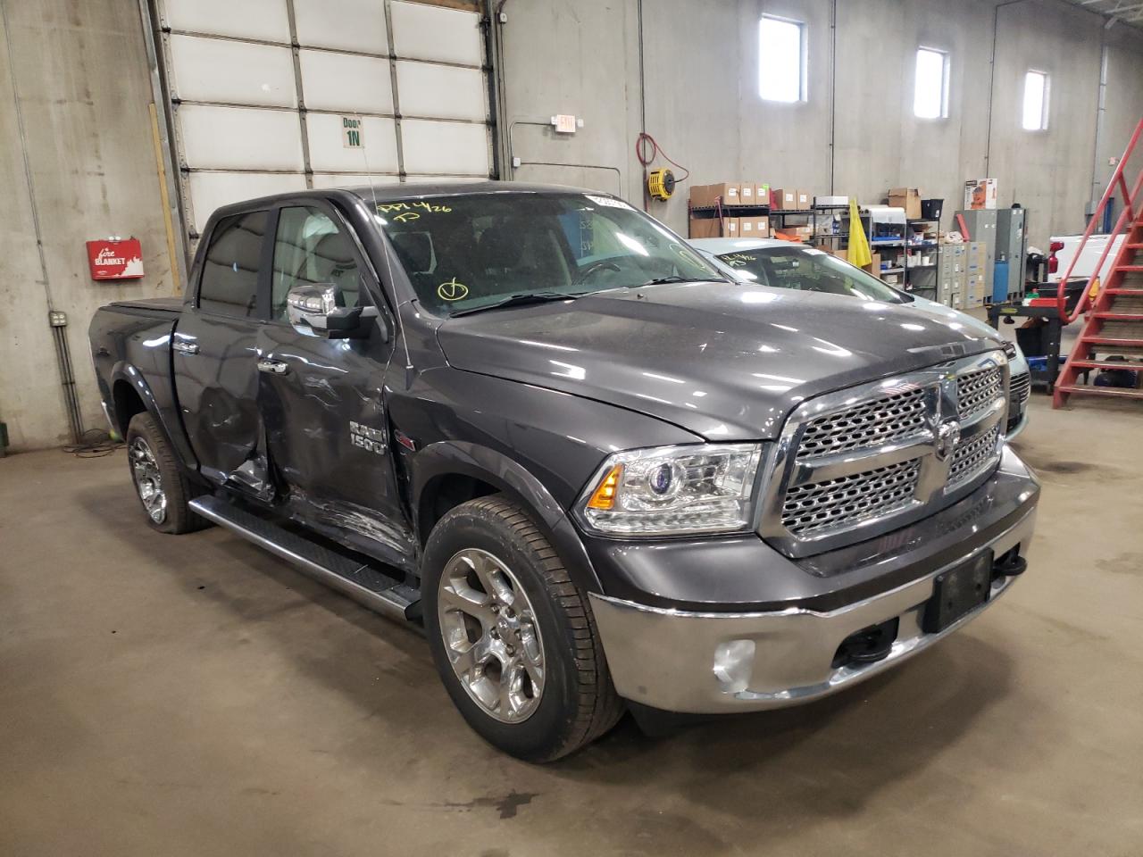RAM 1500 LARAM 2018 with VIN 1C6RR7NMXJS252966 - Photo from auction