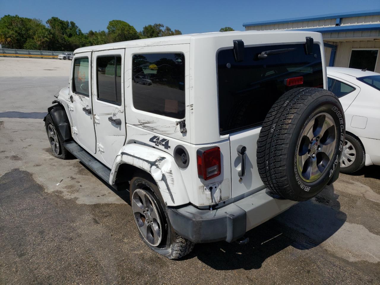 Photo 3 from auction – 2014 JEEP WRANGLER U with VIN 1C4BJWEG4EL106343