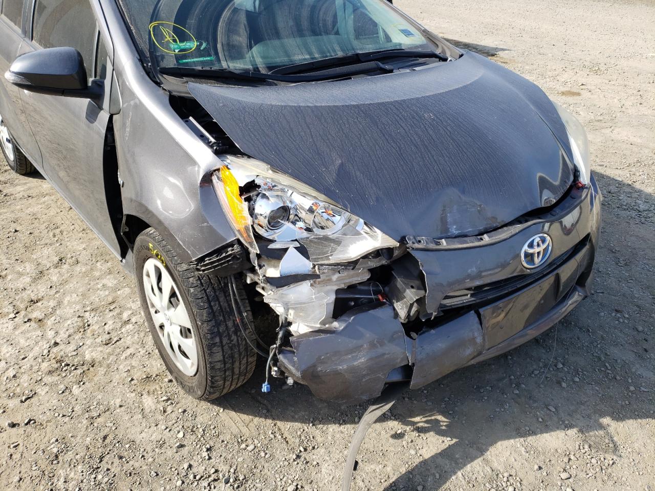 Photo 9 from auction – 2013 TOYOTA PRIUS C with VIN JTDKDTB36D1053274