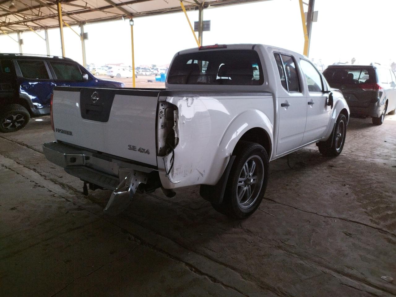 Photo 4 from auction – 2009 NISSAN FRONTIER C with VIN 1N6AD07W39C410402