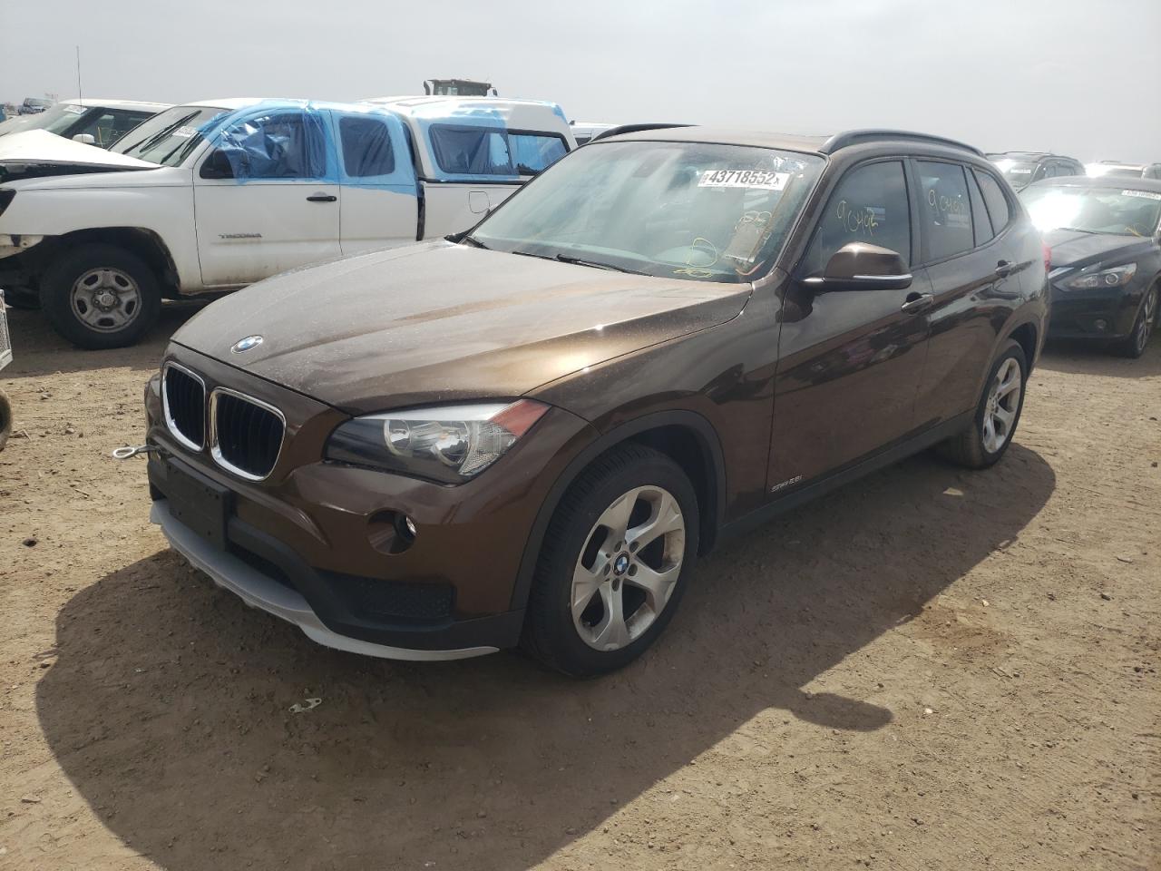 Photo 2 from auction – 2015 BMW X1 SDRIVE2 with VIN WBAVM1C58FVW56902