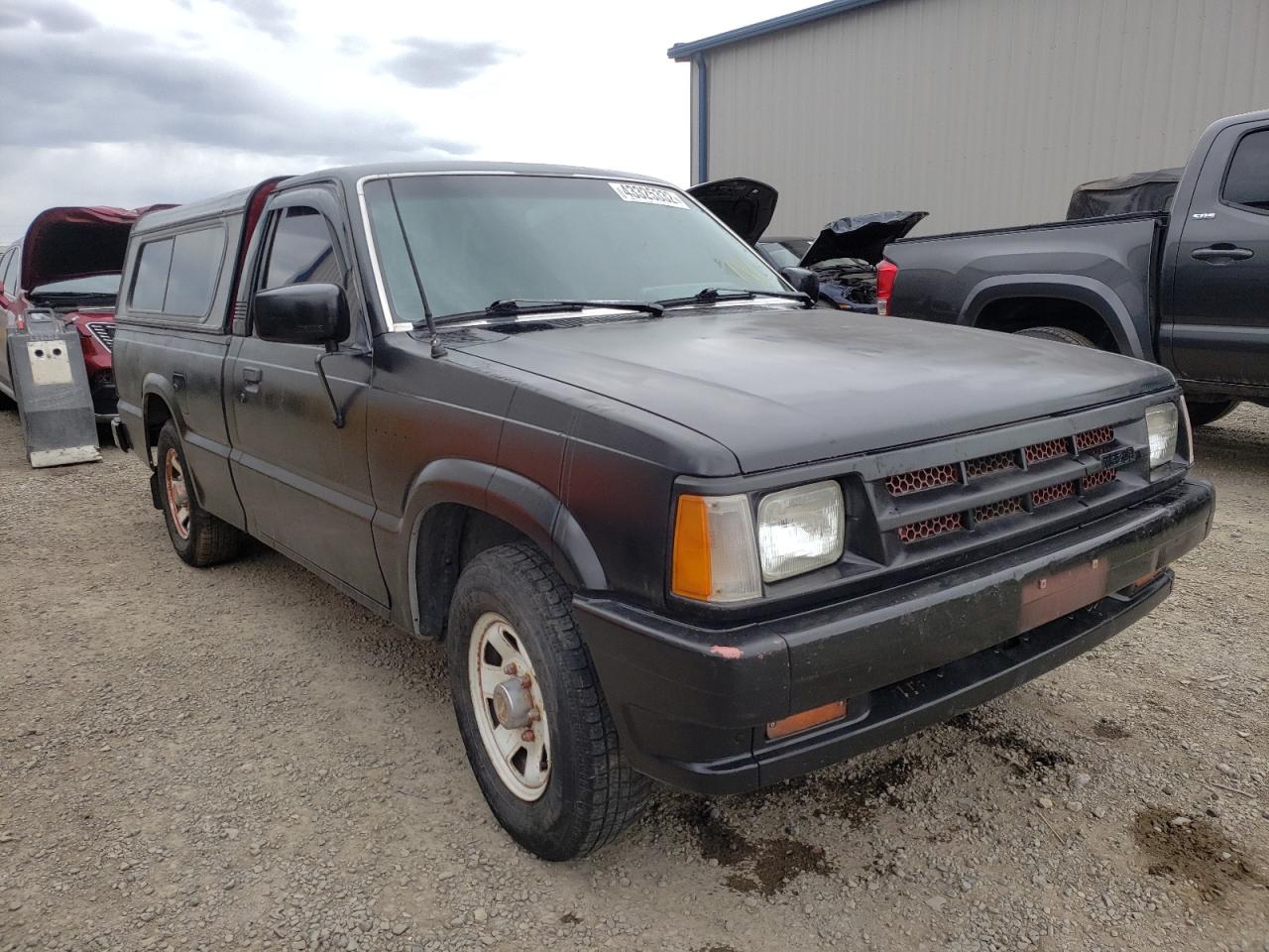 MAZDA B2000 1987 with VIN JM2UF1113H0615243 - Photo from auction