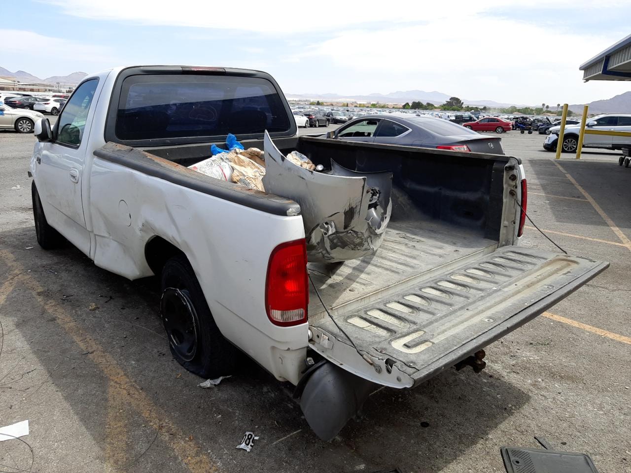 Photo 3 from auction – 2003 FORD F150 with VIN 1FTRF17283NB13107