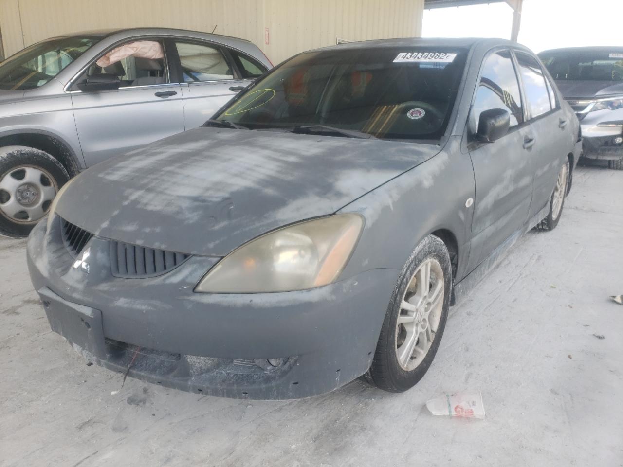 Photo 2 from auction – 2004 MITSUBISHI LANCER RAL with VIN JA3AJ66F64U028799