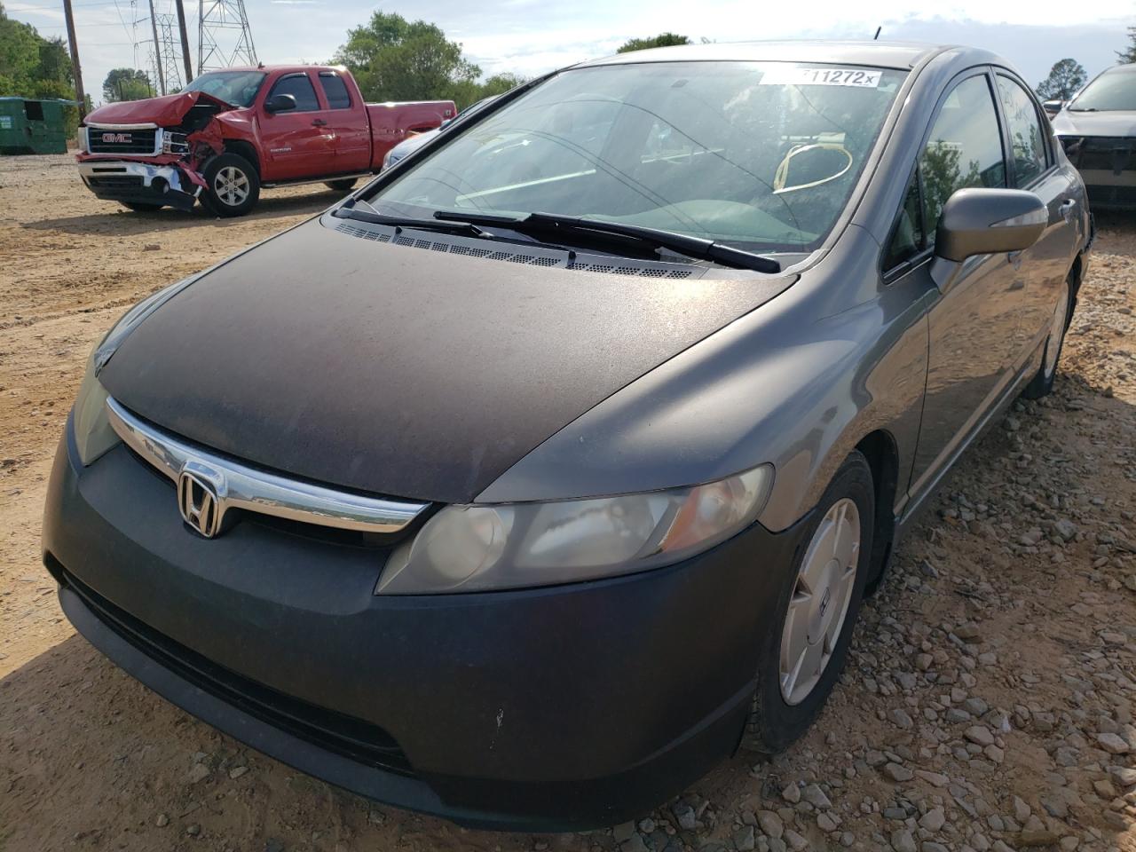 Photo 2 from auction – 2006 HONDA CIVIC HYBR with VIN JHMFA36216S007066