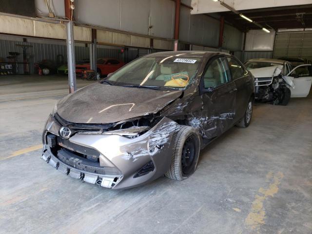 Photo 2 from auction – 2017 TOYOTA COROLLA L with VIN 5YFBURHE2HP691387