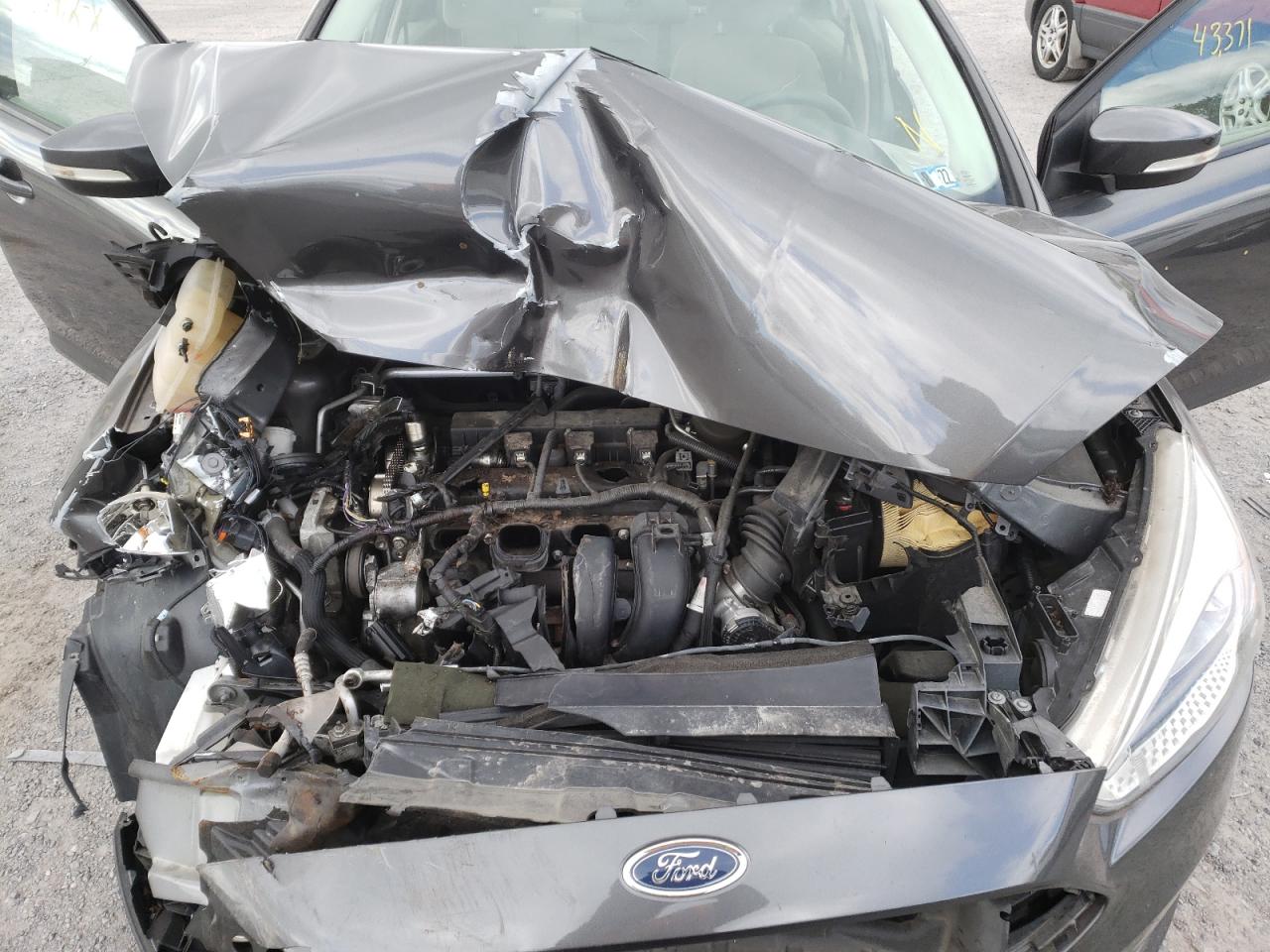 Photo 7 from auction – 2015 FORD FOCUS SE with VIN 1FADP3F2XFL355021