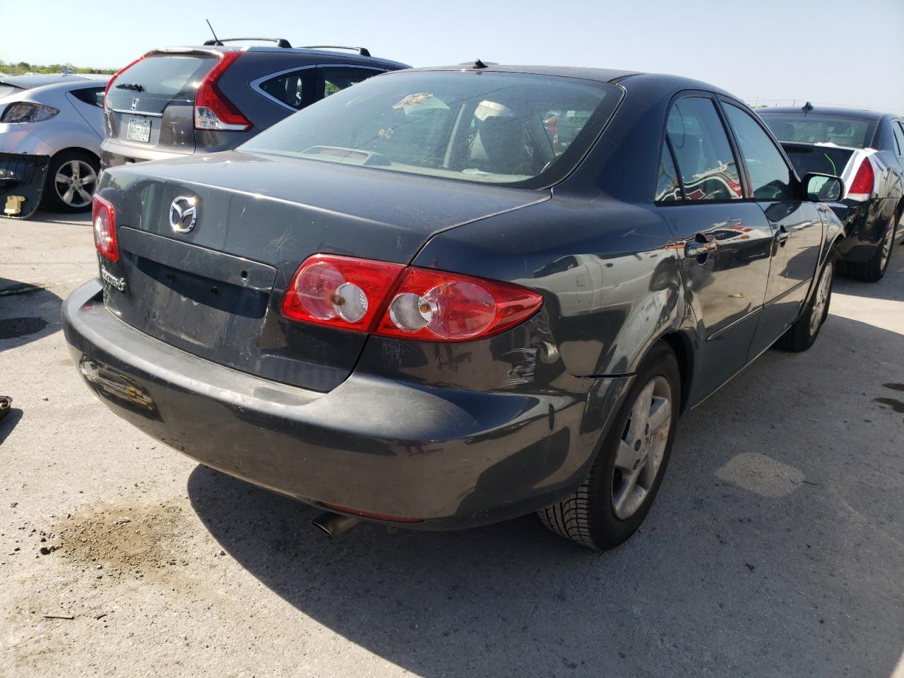Photo 4 from auction – 2004 MAZDA 6 I with VIN 1YVFP80CX45N38058