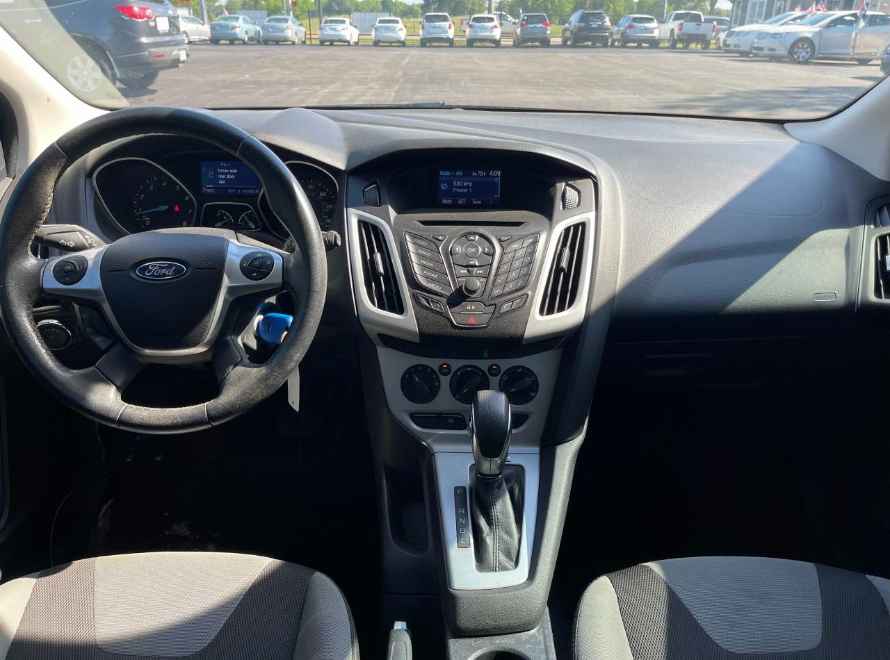 Photo 9 from auction – 2014 FORD FOCUS SE with VIN 1FADP3K25EL115234