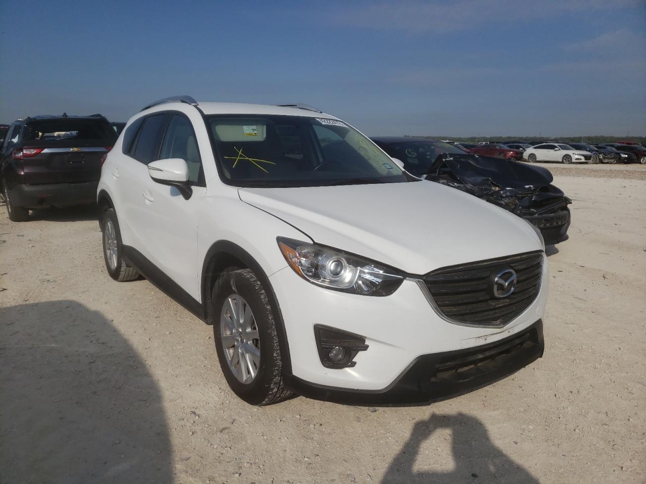 MAZDA CX-5 TOURI 2016 with VIN JM3KE2CY1G0623944 - Photo from auction