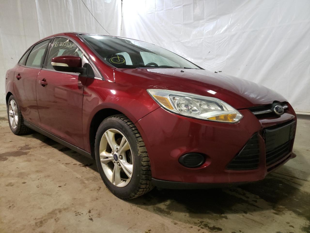 FORD FOCUS 2014 with VIN 1FADP3F20EL205742 - Photo from auction