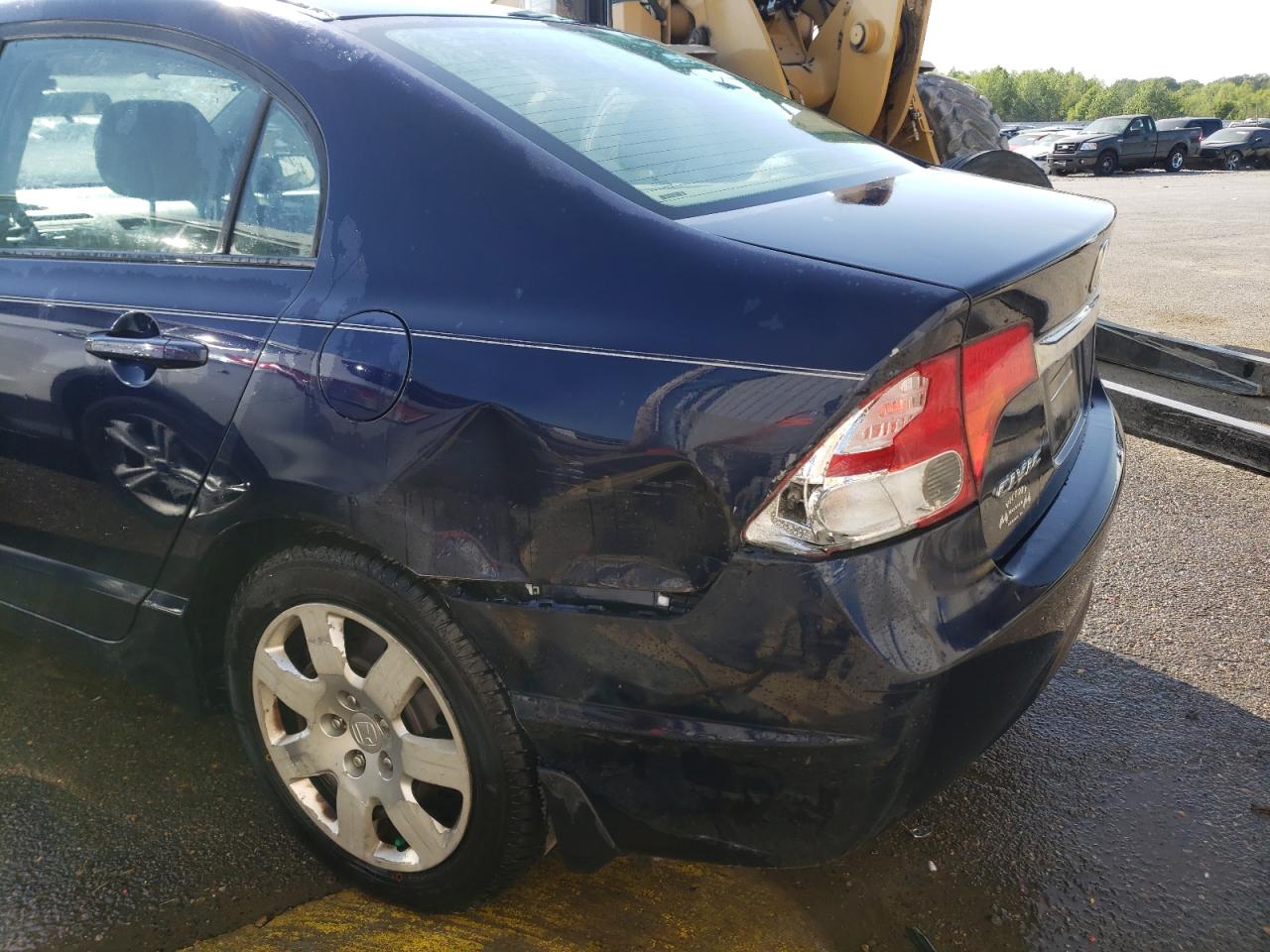 Photo 9 from auction – 2011 HONDA CIVIC LX with VIN 19XFA1F50BE032067