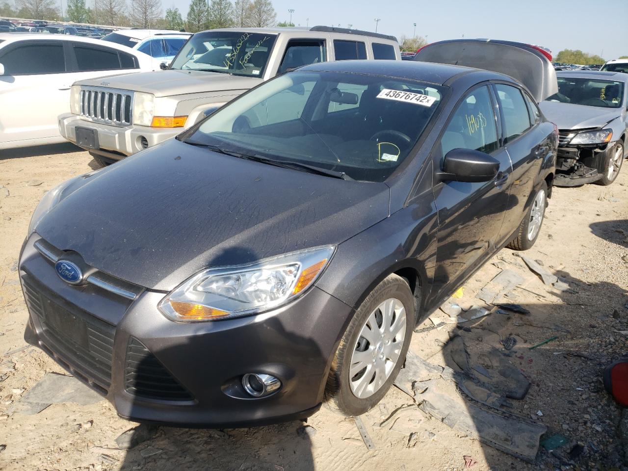 Photo 2 from auction – 2012 FORD FOCUS SE with VIN 1FAHP3F21CL313186