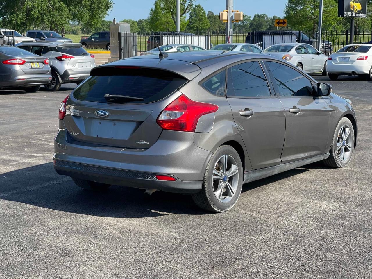 Photo 4 from auction – 2014 FORD FOCUS SE with VIN 1FADP3K25EL115234